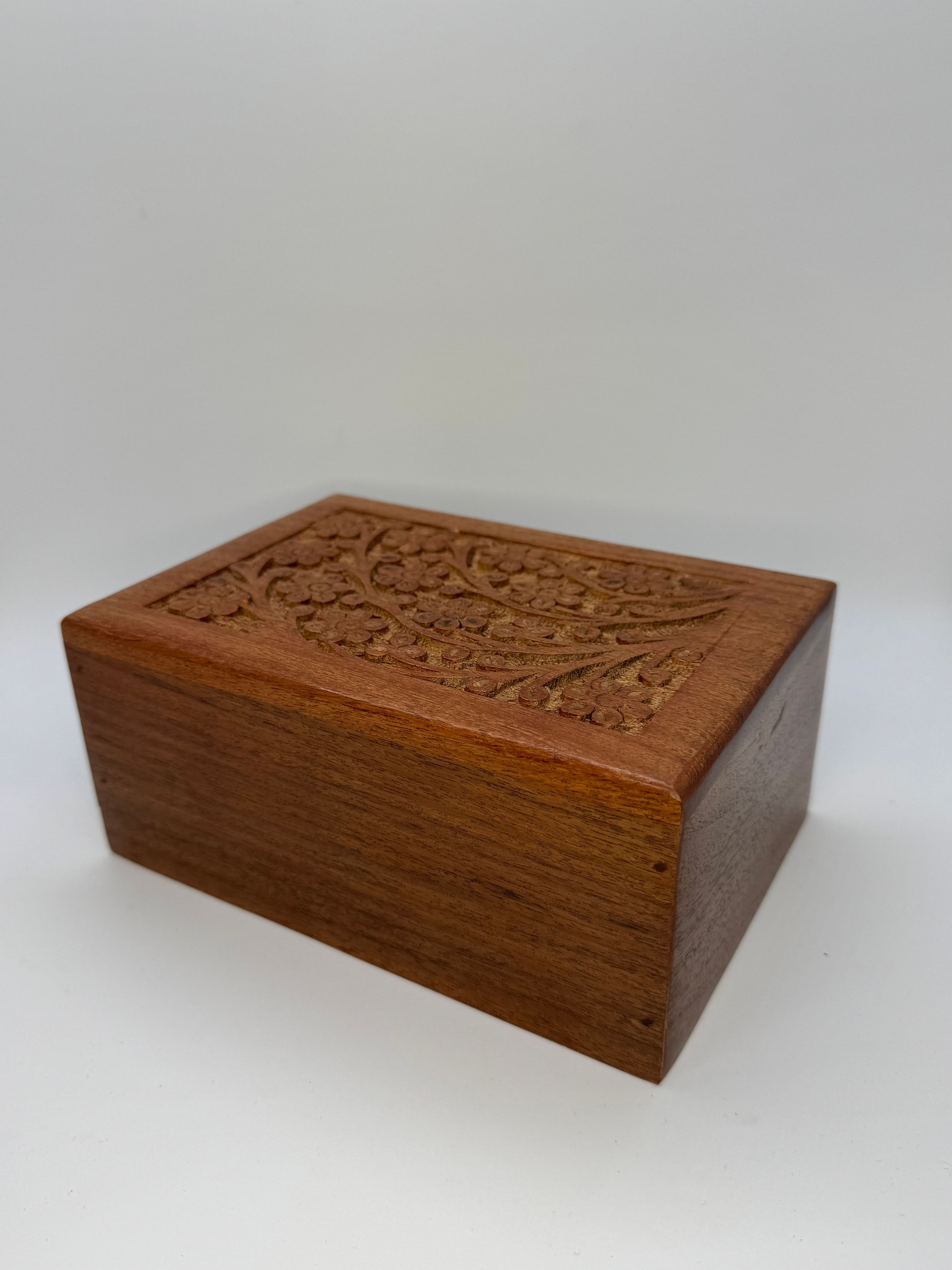Wooden urn with Tree of Life carving. Complementary urn included in IND-URN bundles.